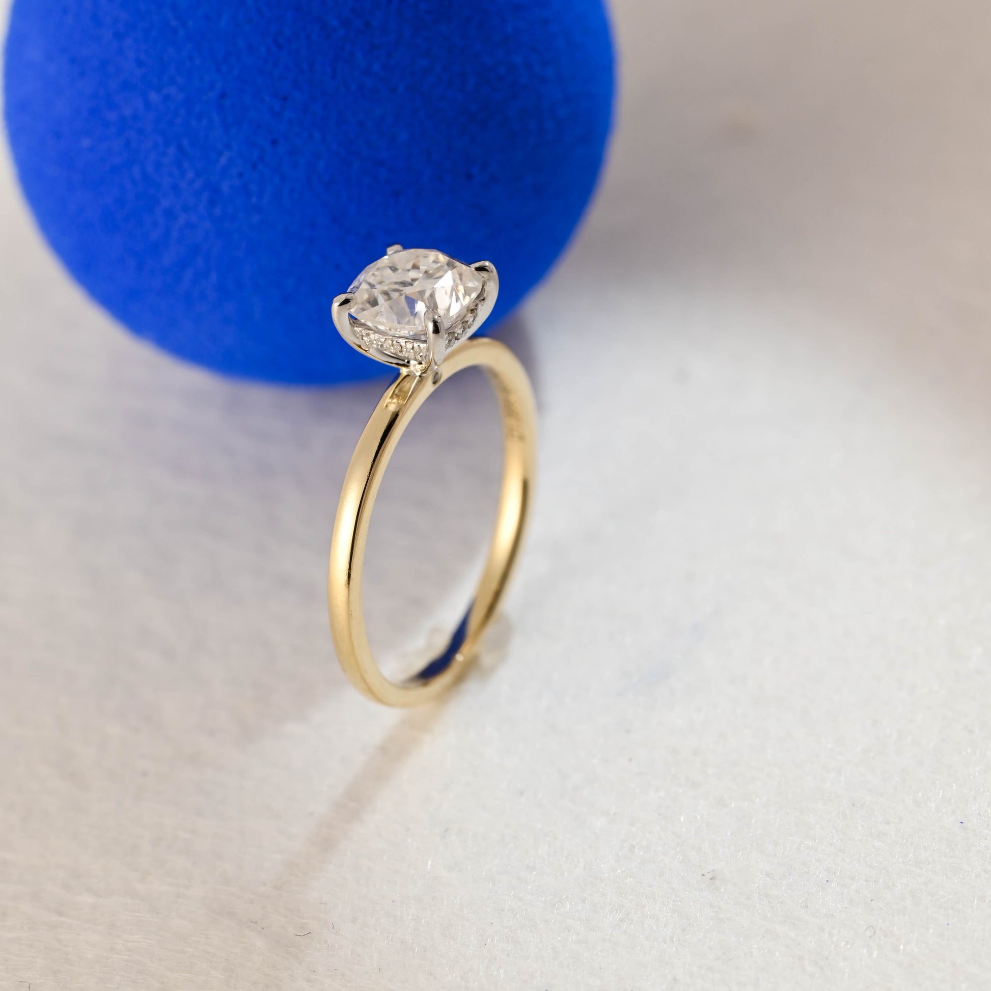 solid-gold-two-tone-ring-cushion-cut-moissanite-engagement-ring-hidden-halo