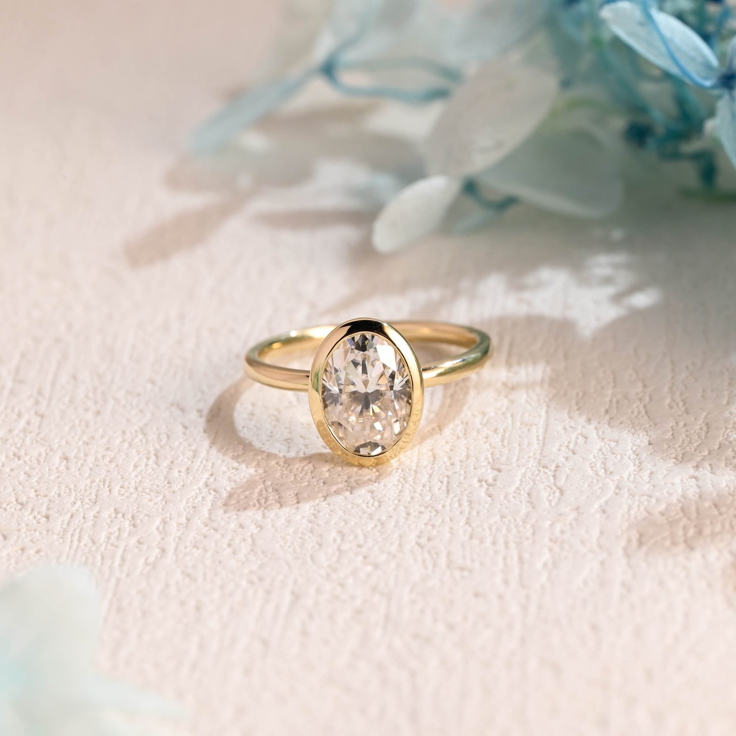 bezel-oval-moissanite-engagement-ring-crushed-ice-cut-solitaire-oval-cut-wedding-ring