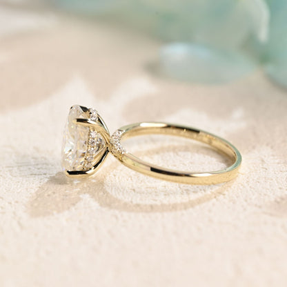 solid-gold-oval-cut-moissanite-engagement-ring-hidden-halo