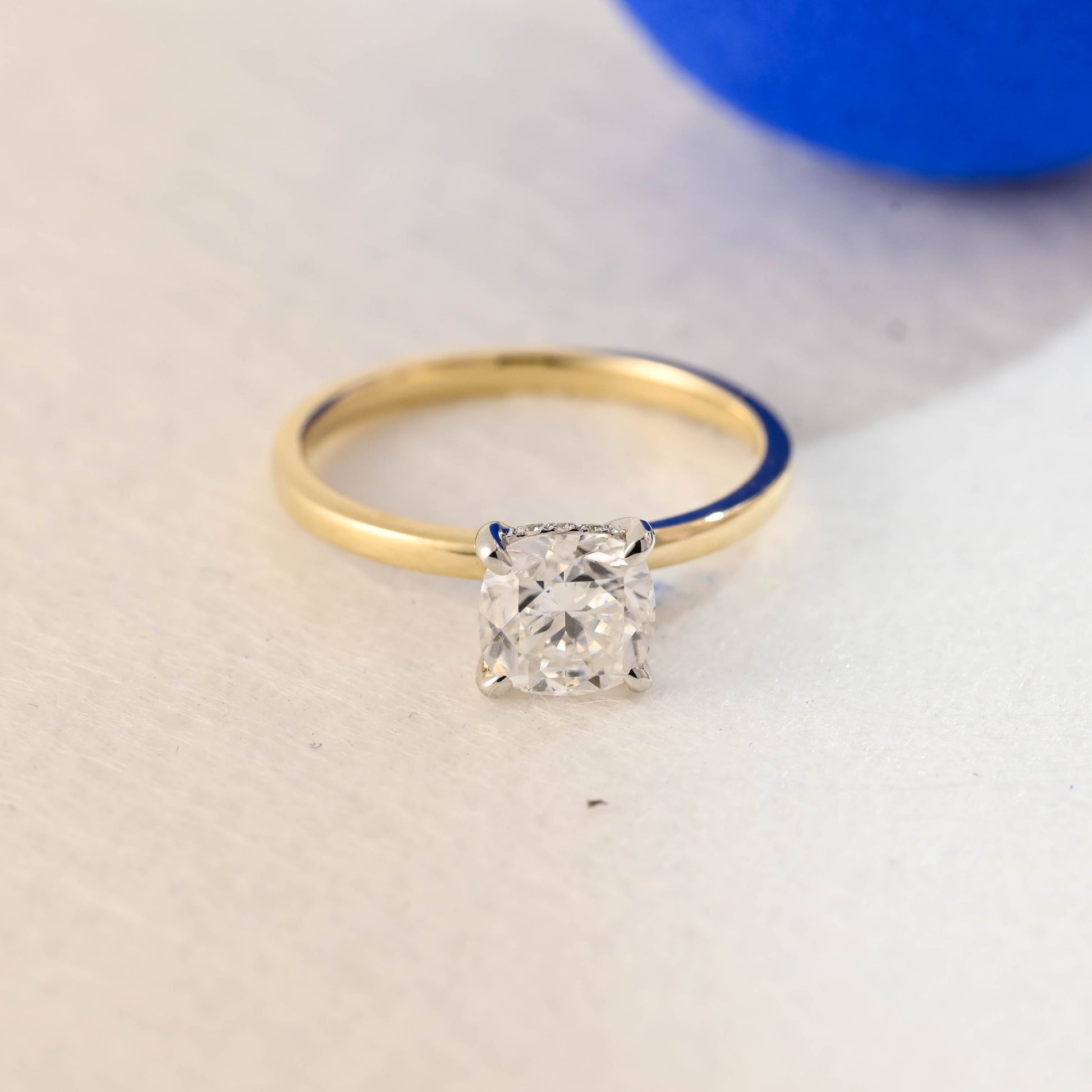 solid-gold-two-tone-ring-cushion-cut-moissanite-engagement-ring-hidden-halo