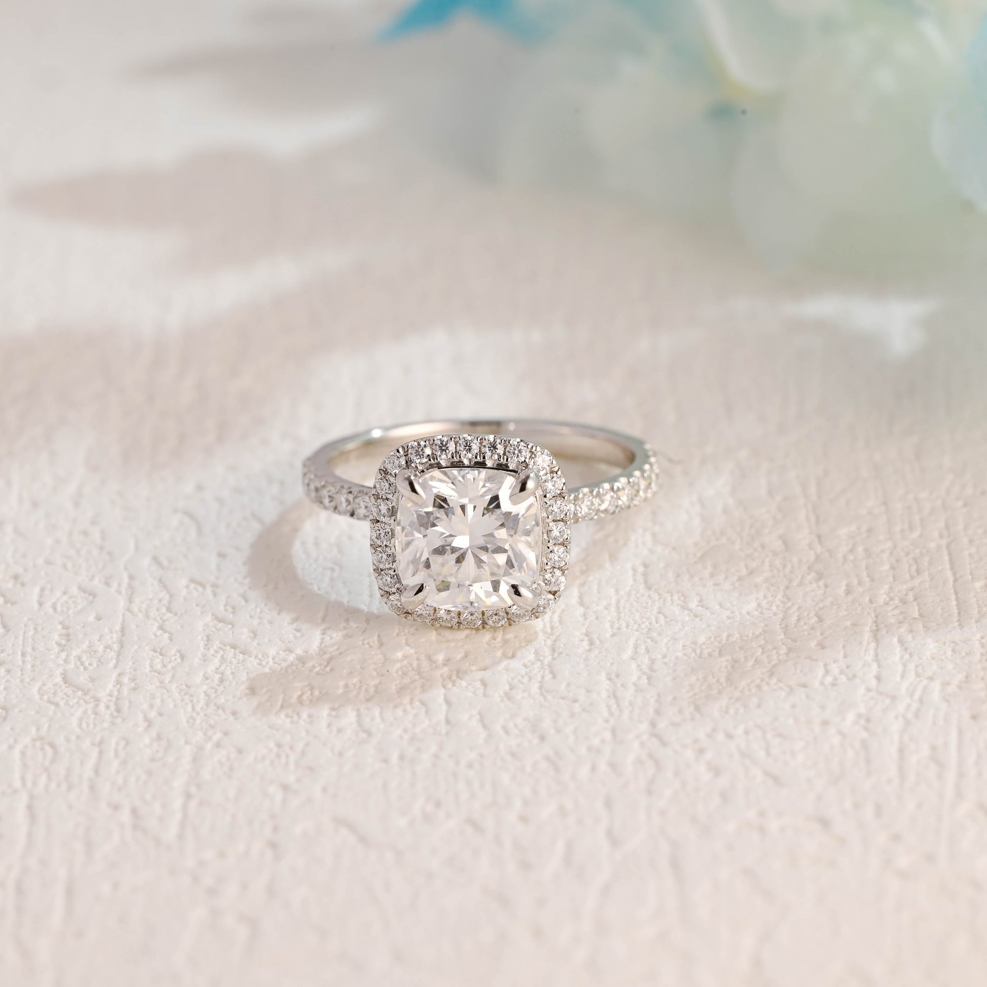 solid-gold-cushion-cut-moissanite-engagement-ring-paved-halo-ring