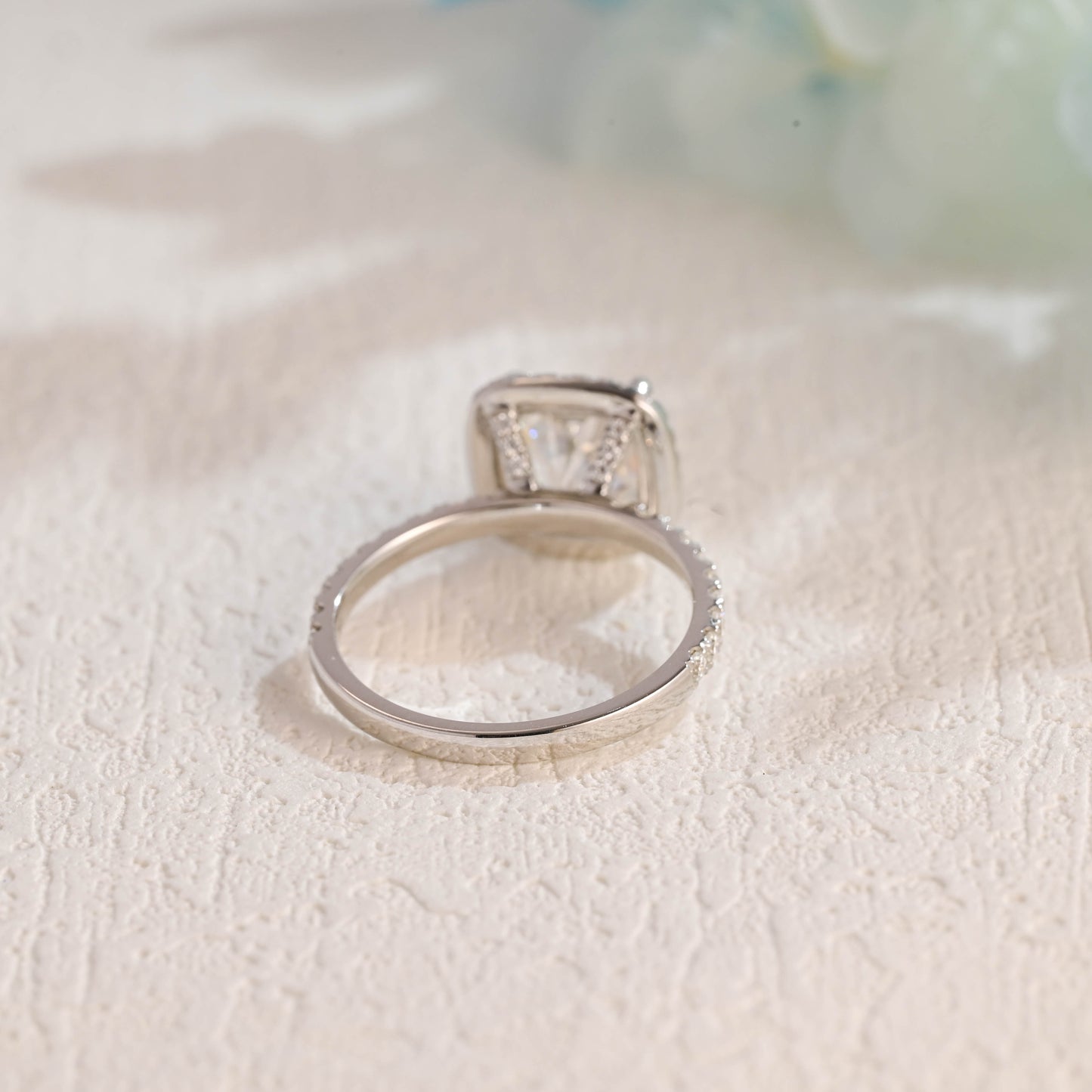 solid-gold-cushion-cut-moissanite-engagement-ring-paved-halo-ring