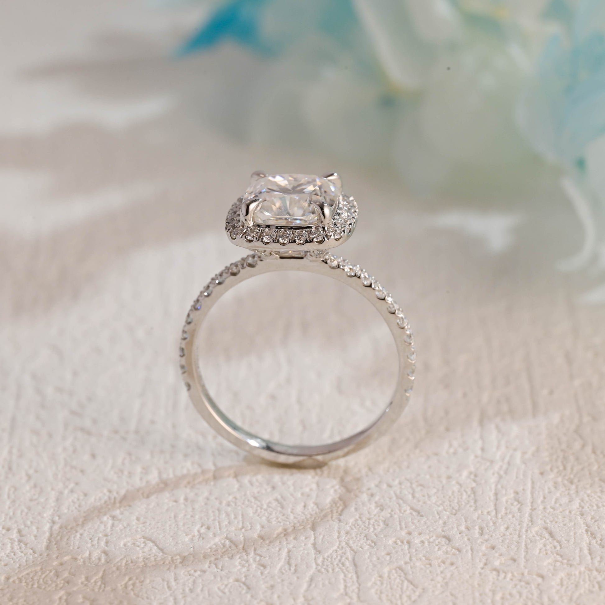 solid-gold-cushion-cut-moissanite-engagement-ring-paved-halo-ring