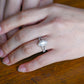 solid-gold-marquise-cut-moissanite-engagement-ring-split-shank-ring-paved-ring