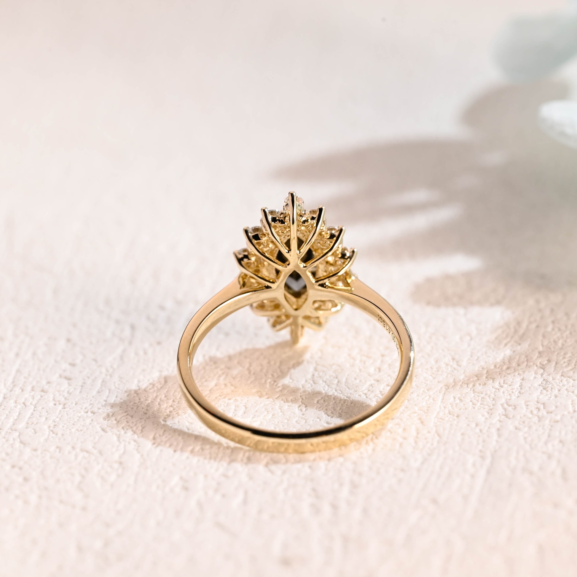 solid-gold-marquise-cut-black-moissanite-engagement-ring