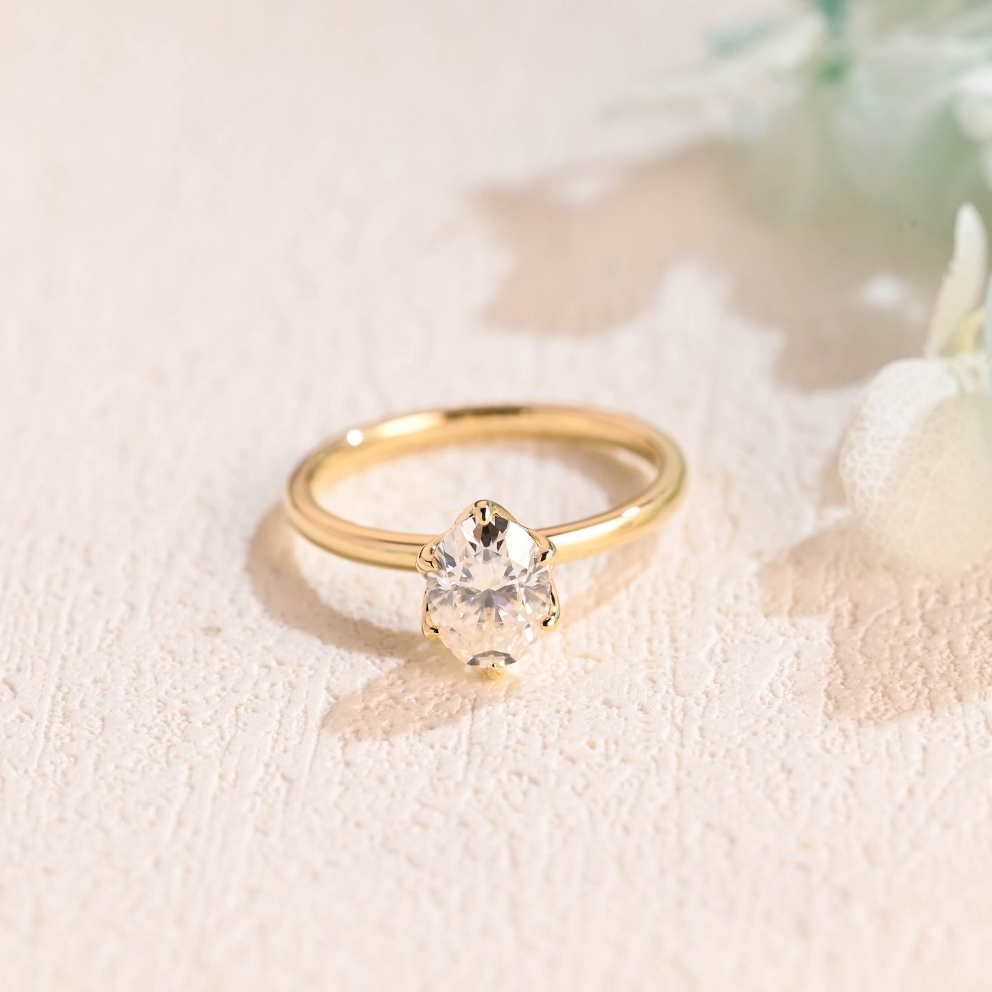 tulip-setting-oval-moissanite-engagement