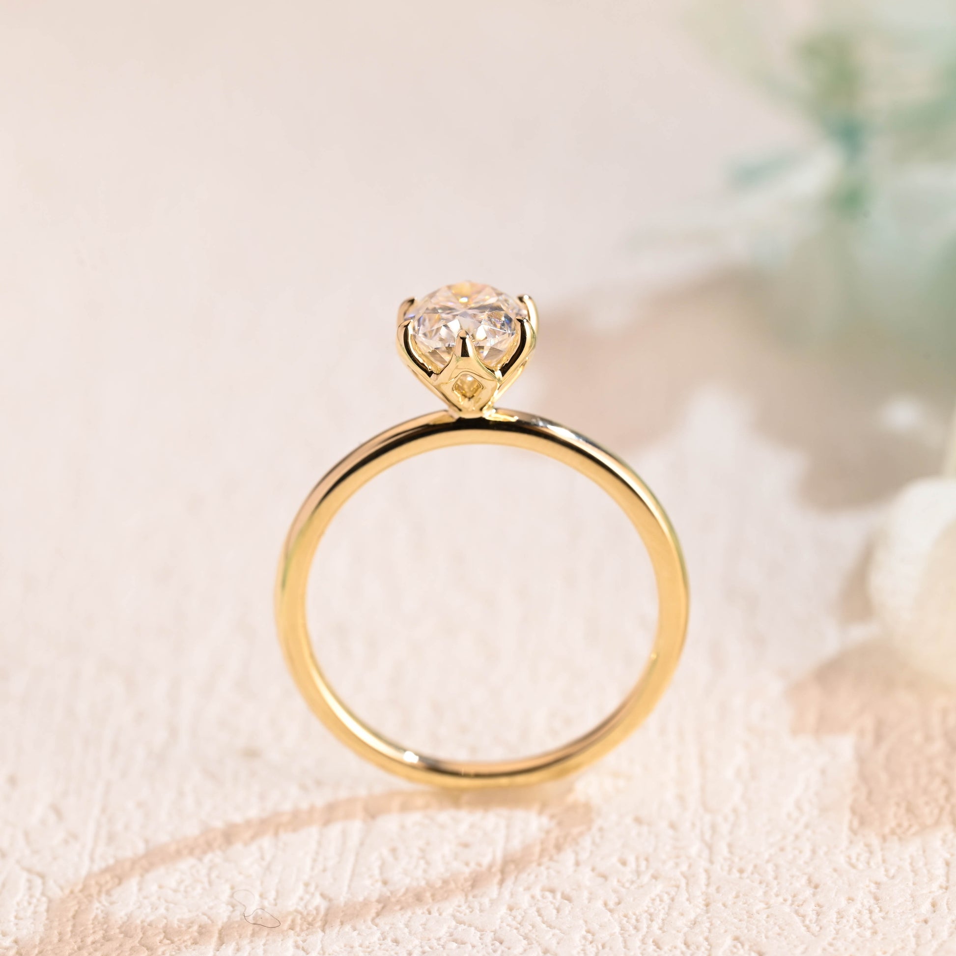 tulip-setting-oval-moissanite-engagement