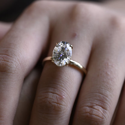 solid-gold-oval-cut-moissanite-engagement-ring-hidden-halo