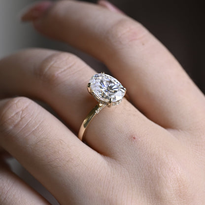 solid-gold-oval-cut-moissanite-engagement-ring-hidden-halo