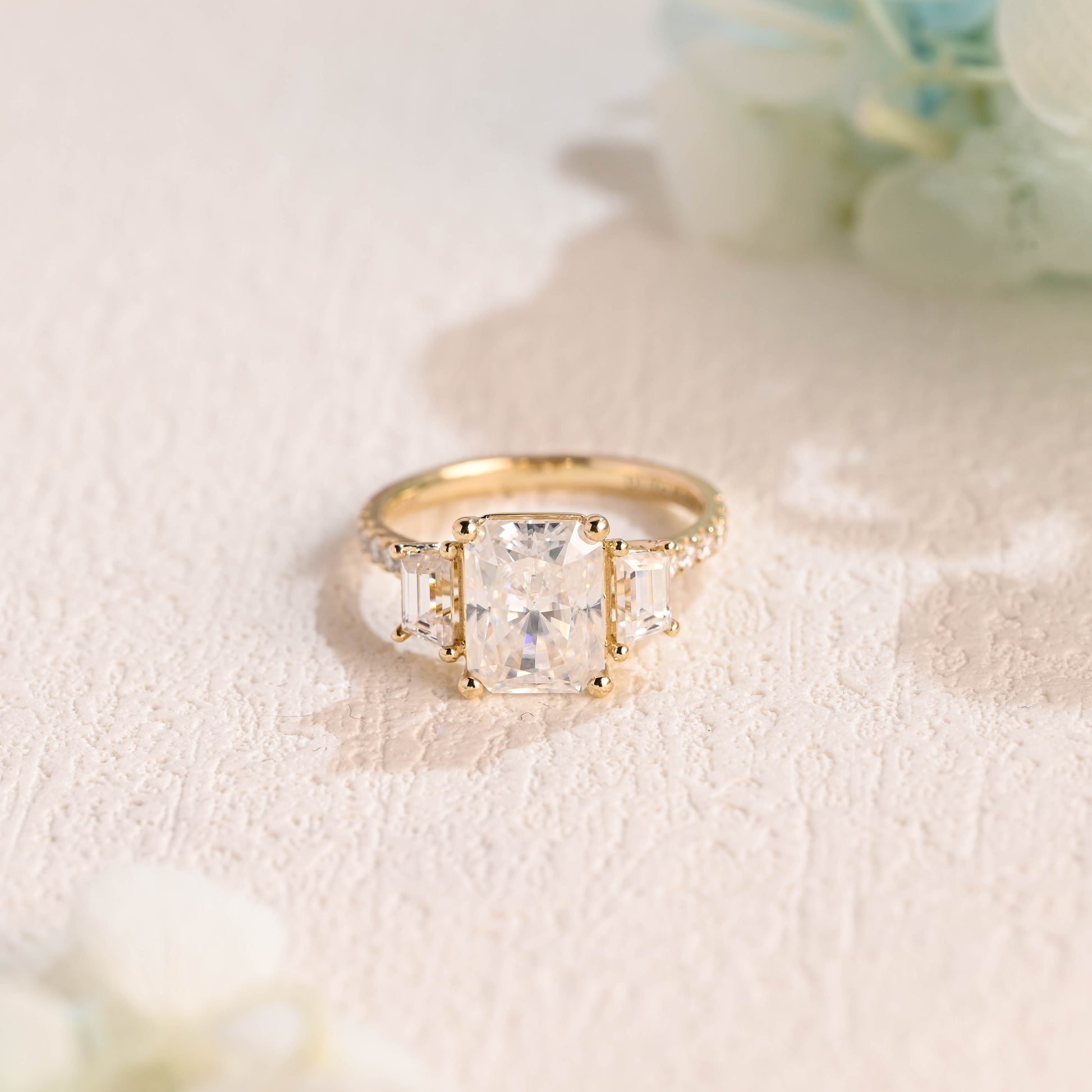 Solid-gold-radiant-cut-moissanite-engagement-ring-three-stone-ring