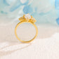 solid-gold-marquise-cut-moissanite-engagement-ring-side-stone-round-ring-cluster-ring