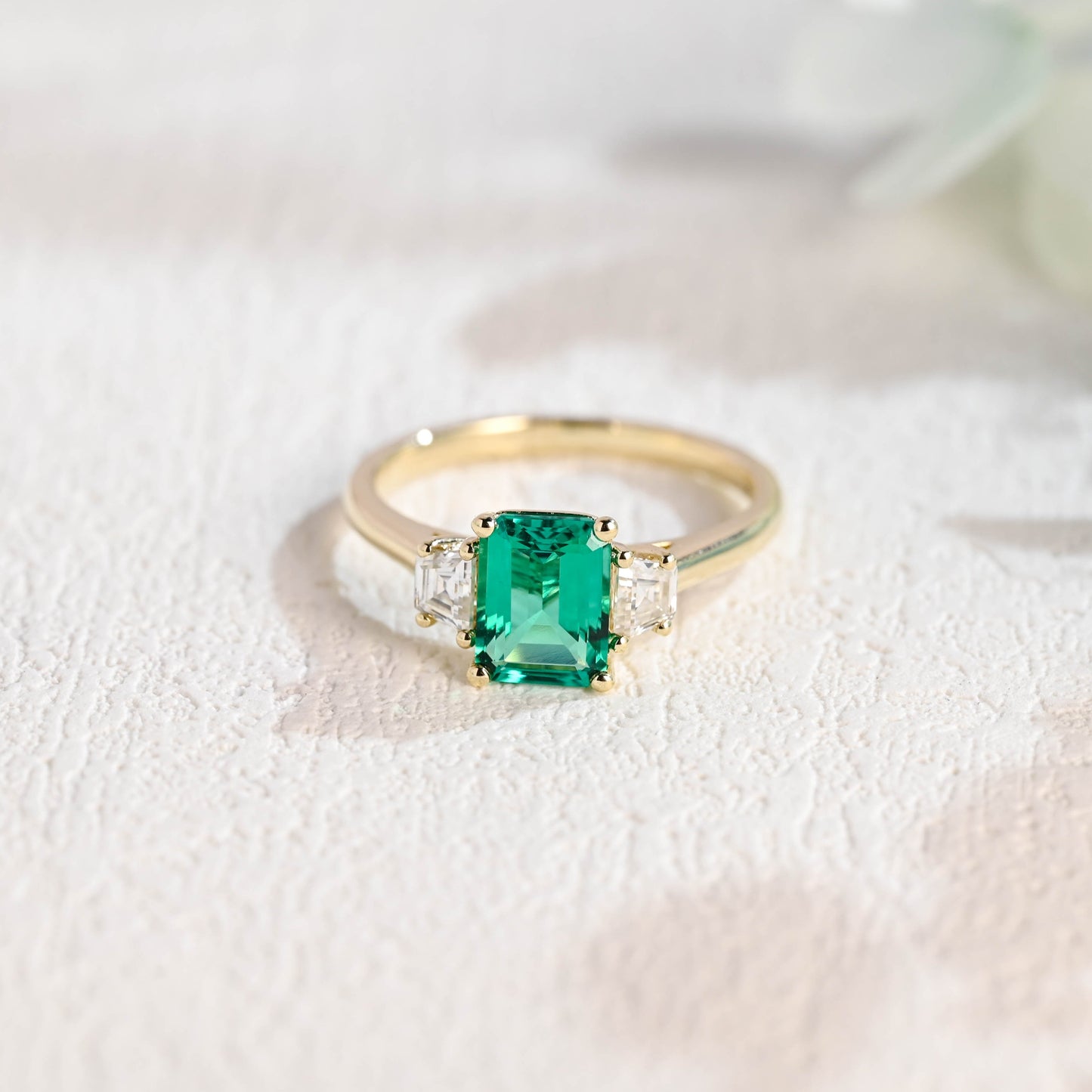 solid-gold-three-stone-lab-grown-emerald-engagement-ring