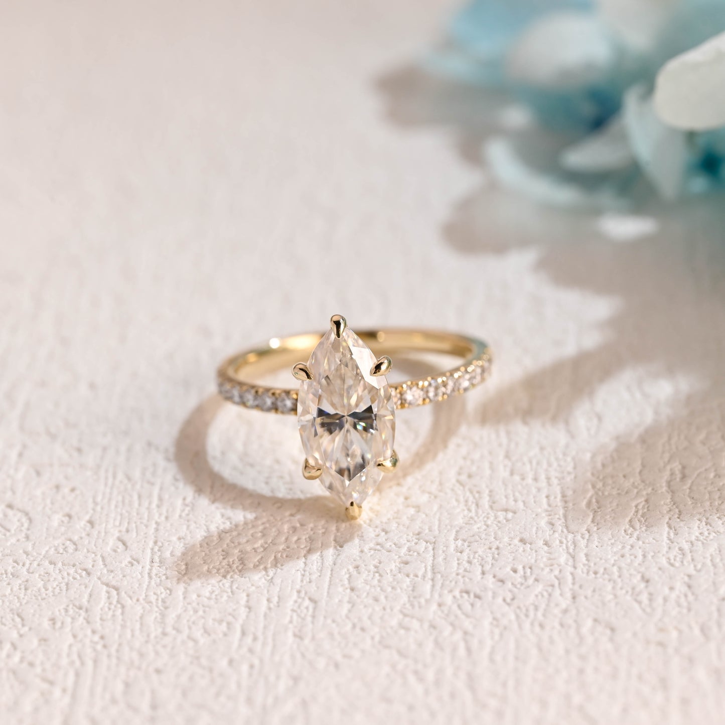 solid-gold-paved-marquise-cut-moissanite-engagement-ring