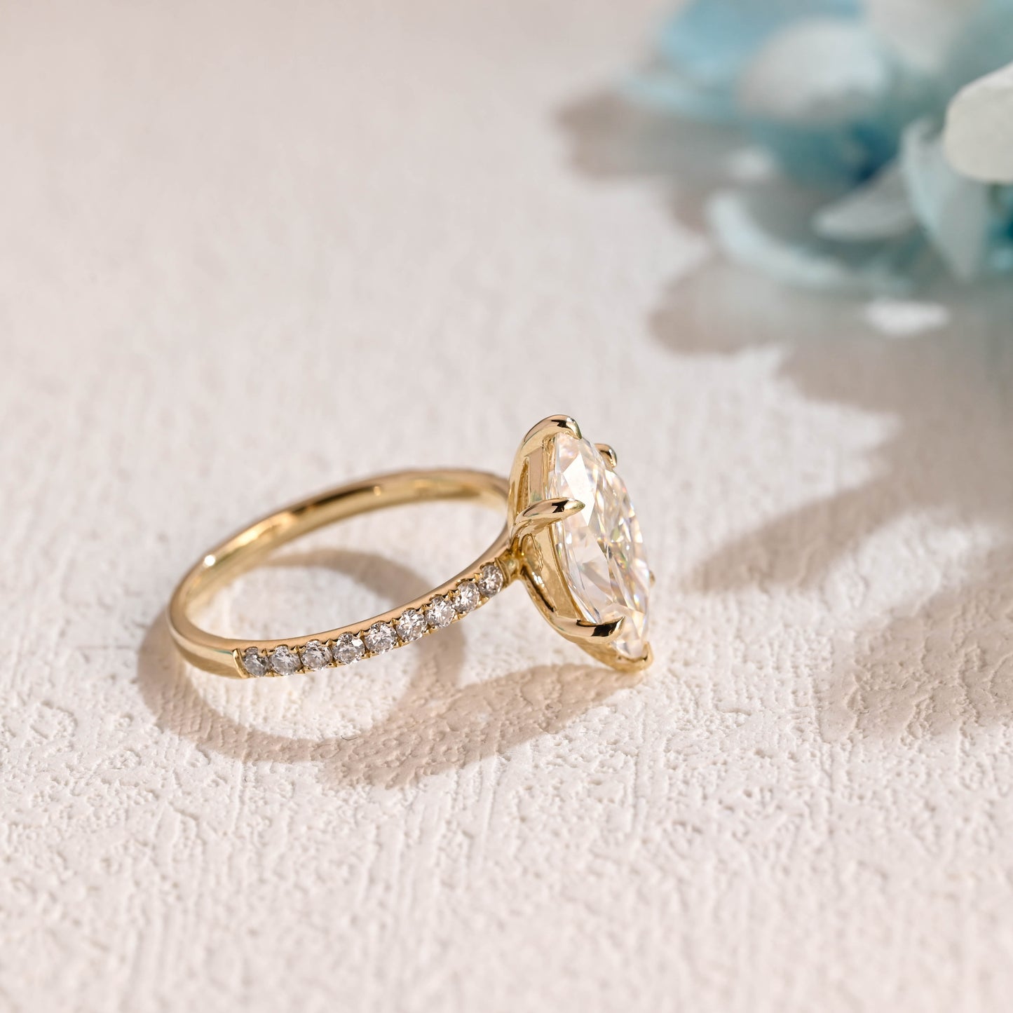 solid-gold-paved-marquise-cut-moissanite-engagement-ring