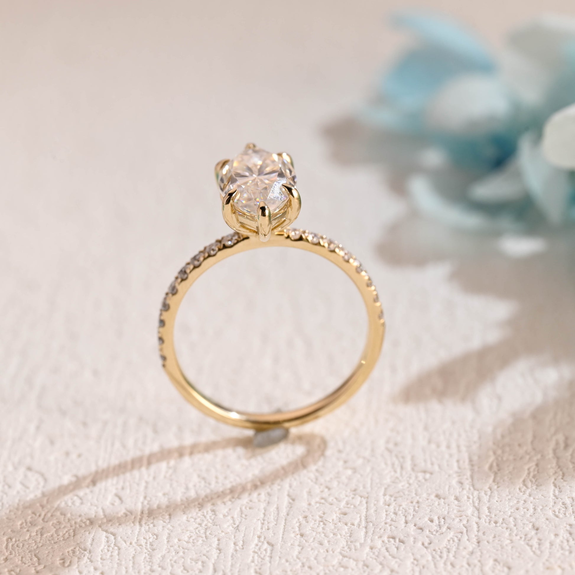 solid-gold-paved-marquise-cut-moissanite-engagement-ring