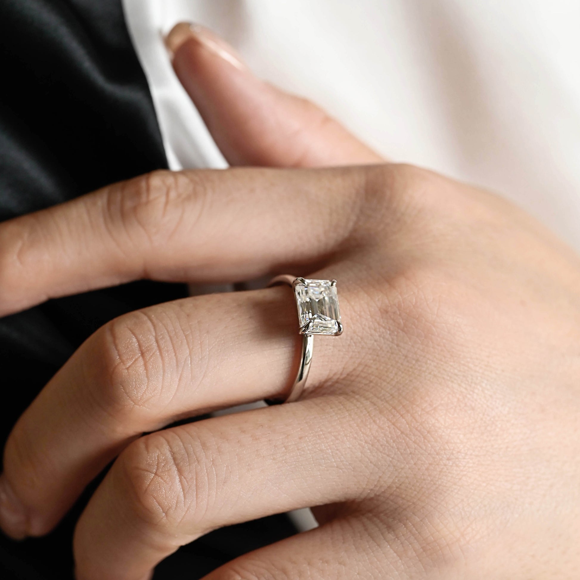 solid-gold-emerald-cut-diamond-engagement-ring-solitaire-ring