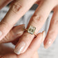 solid-gold-emerald-cut-diamond-ring-bezel-ring-cathedral-setting