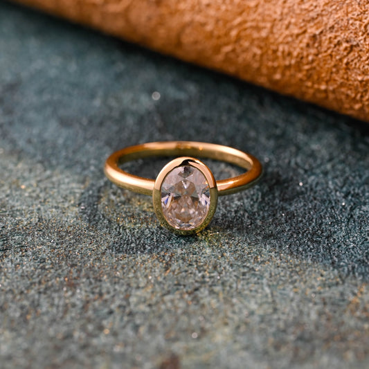 solid-gold-oval-cut-diamond-engagement-ring-bezel-ring