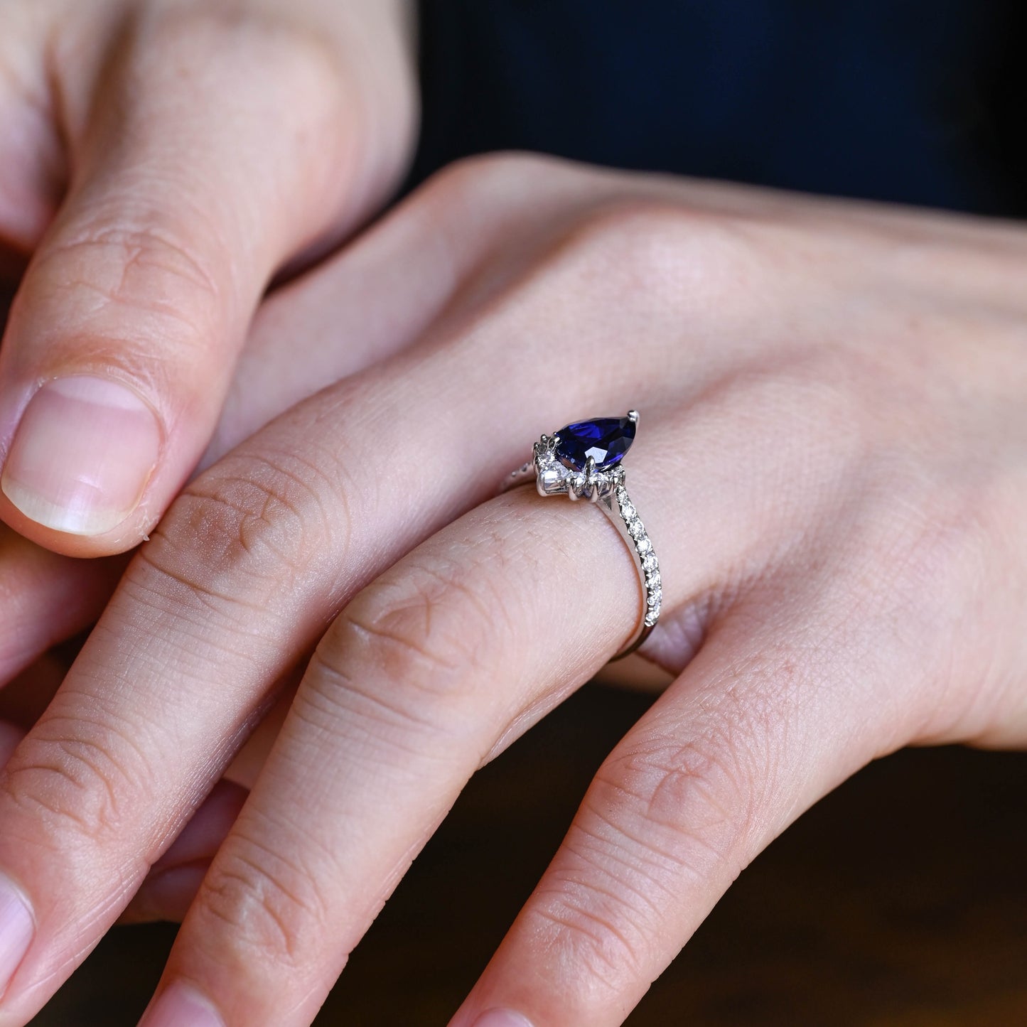 solid-gold-pear-cut-lab-grown-sapphire-engagement-ring