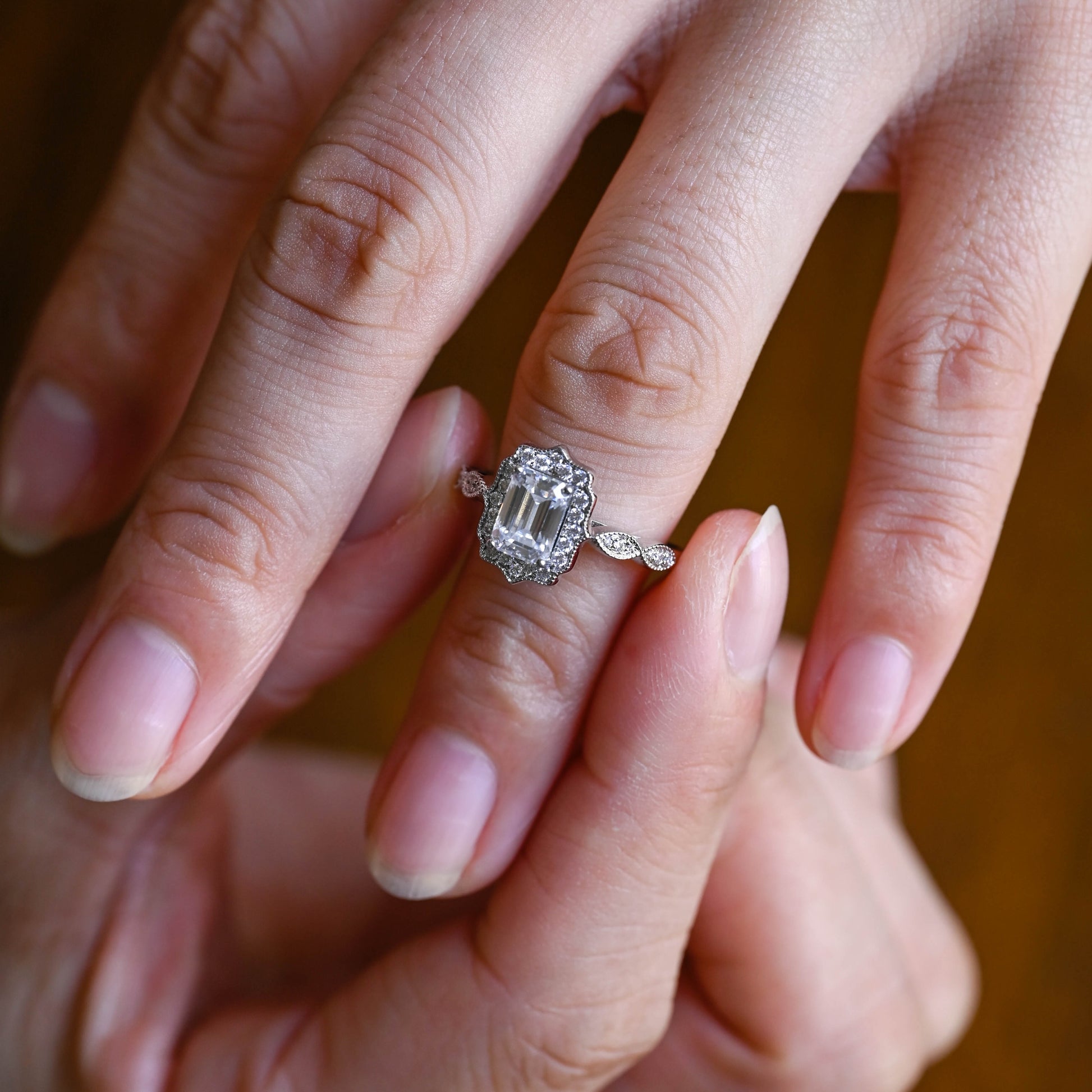 solid-gold-emerald-cut-moissanite-engagement-ring