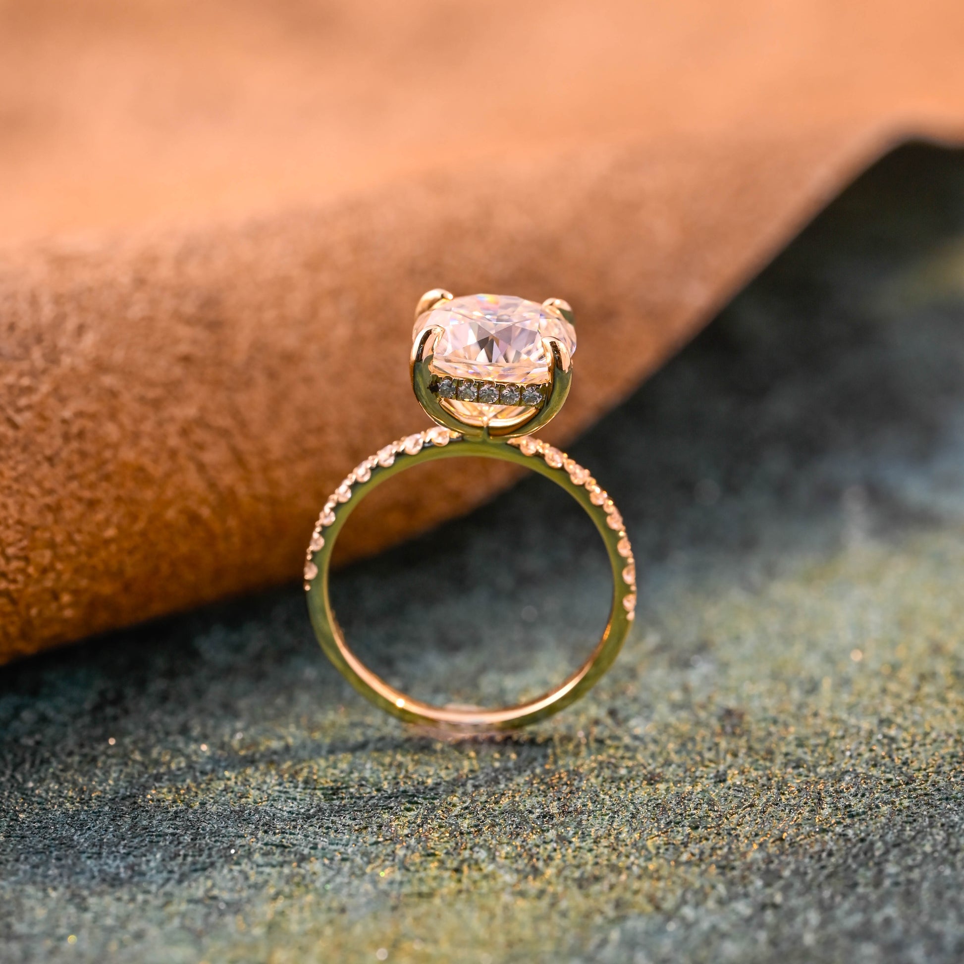 solid-gold-cushion-cut-diamond-engagement-ring-hidden-halo