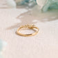 solid-gold-curved-round-cut-moissanite-wedding-band