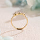 solid-gold-curved-round-cut-moissanite-wedding-band