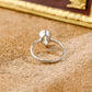 solid-gold-pear-cut-diamond-ring-bezel-ring