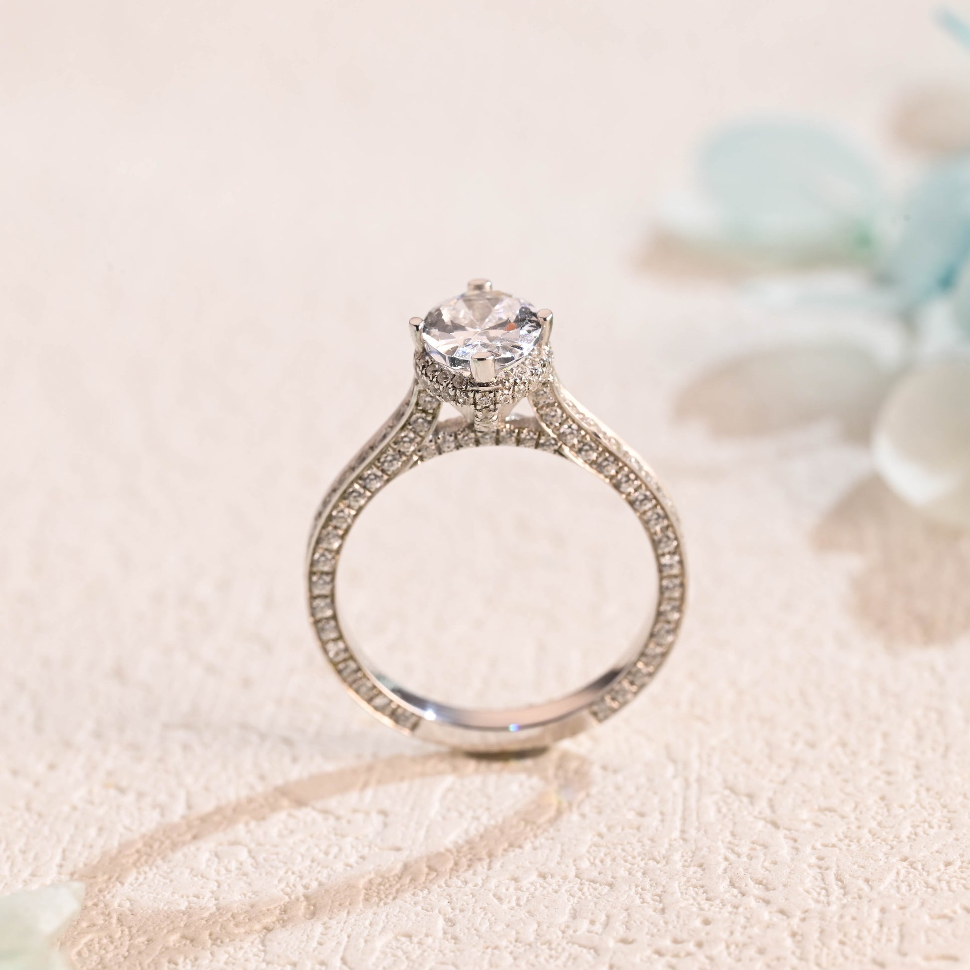 solid-gold-three-row-paved-oval-cut-moissanite-engagement-ring-hidden-halo