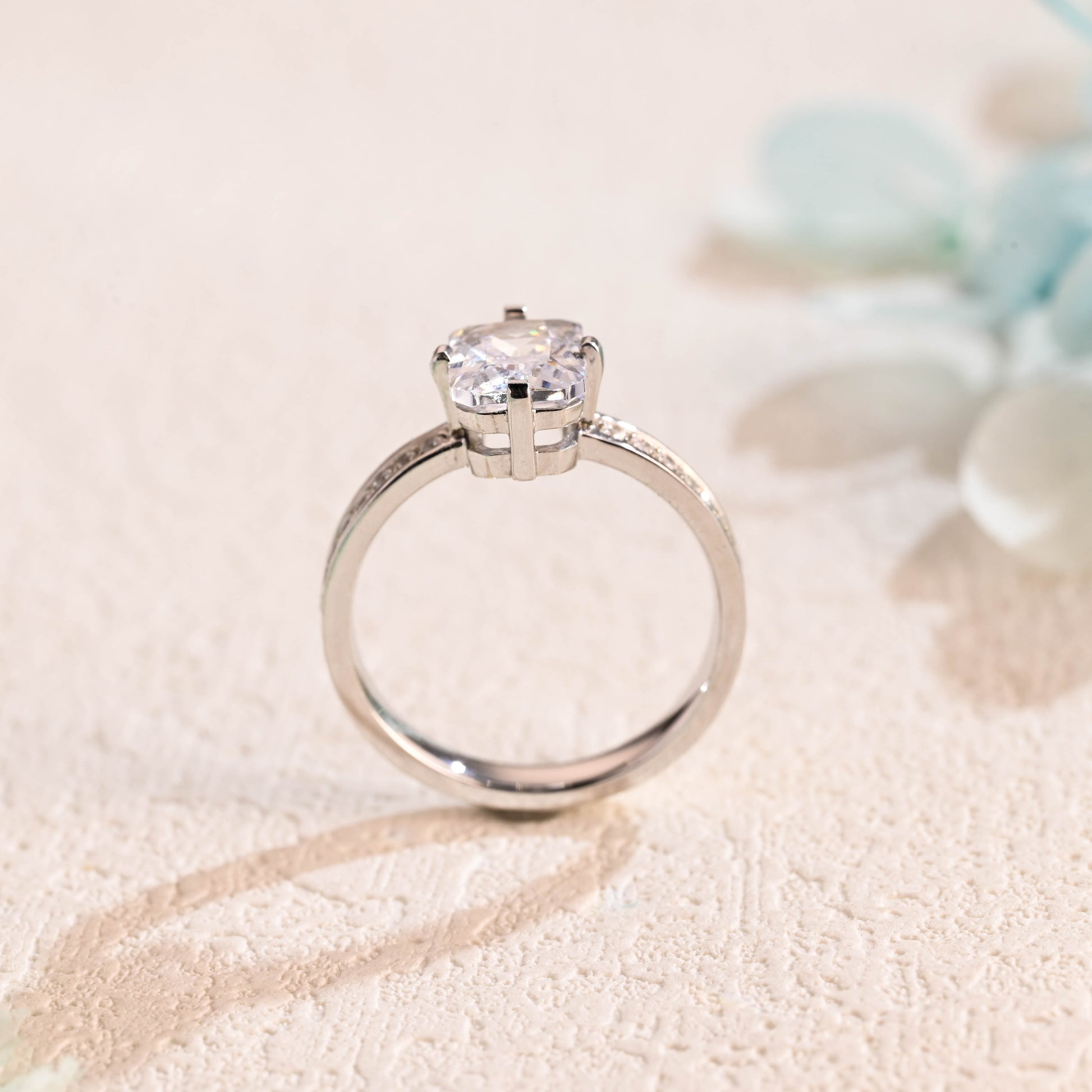 solid-gold-radiant-cut-moissanite-engagement-ring-channel-ring