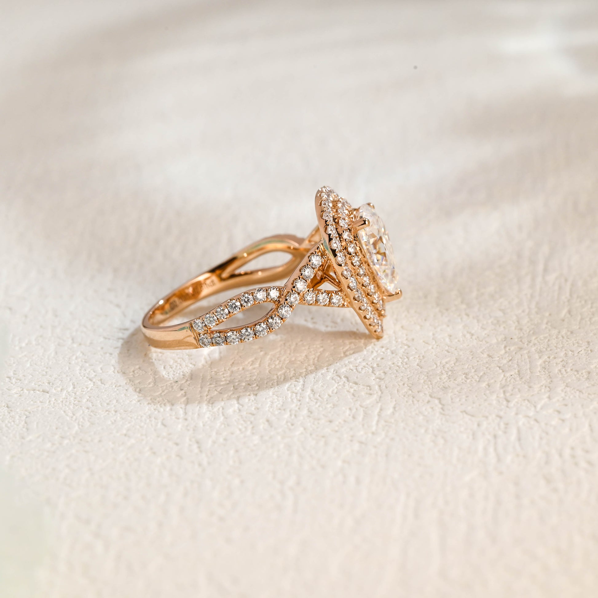 solid-gold-pear-cut-moissanite-engagement-ring-double-halo-ring-twisted-band-ring