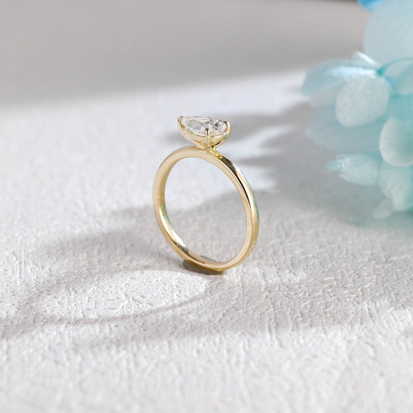 causyou-solid-gold-east-west-pear-moissanite-engagement-ring