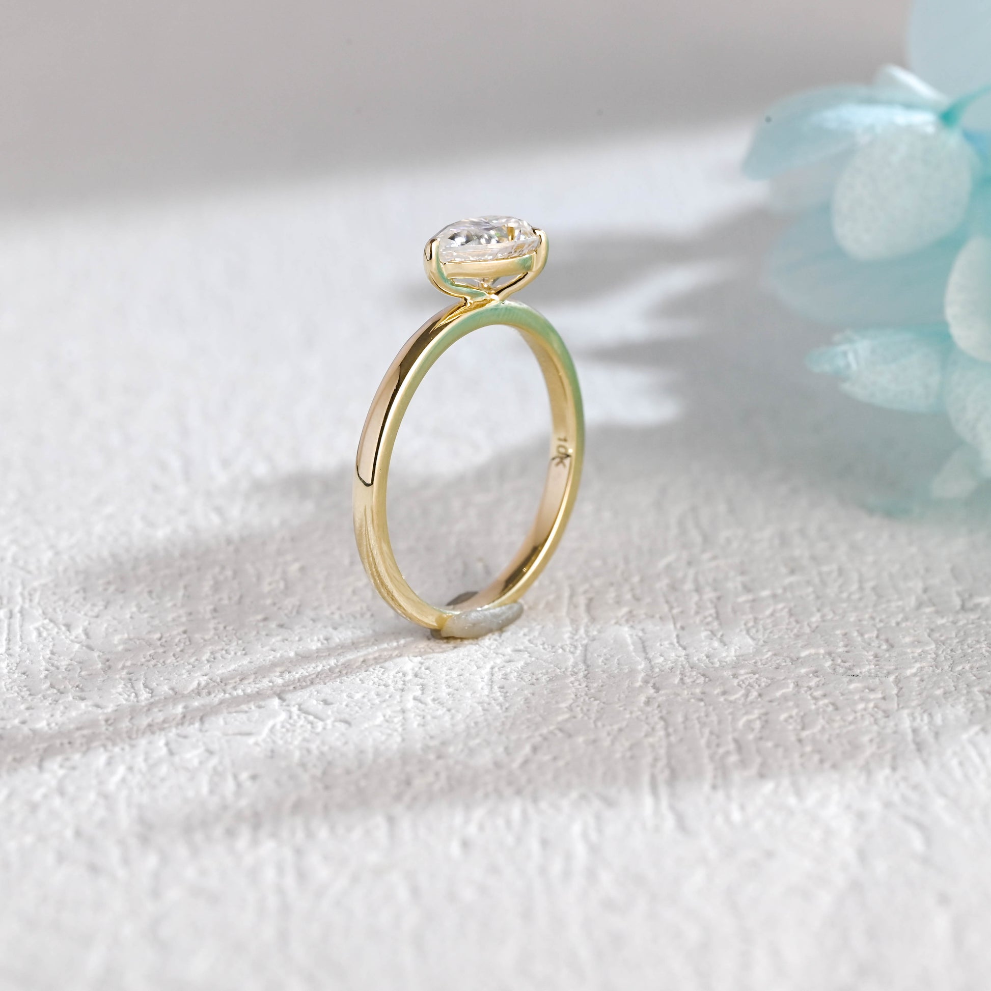 causyou-solid-gold-east-west-pear-moissanite-engagement-ring