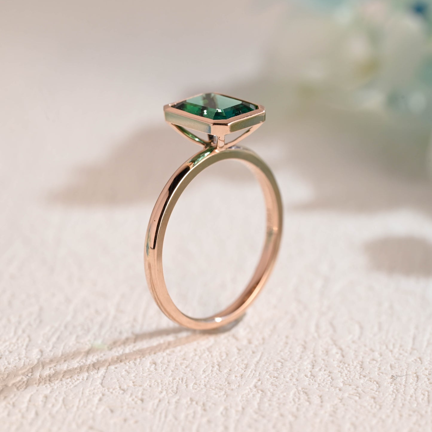 solid-gold-lab-grown-emerald-engagement-ring-promise-ring-bezel-ring