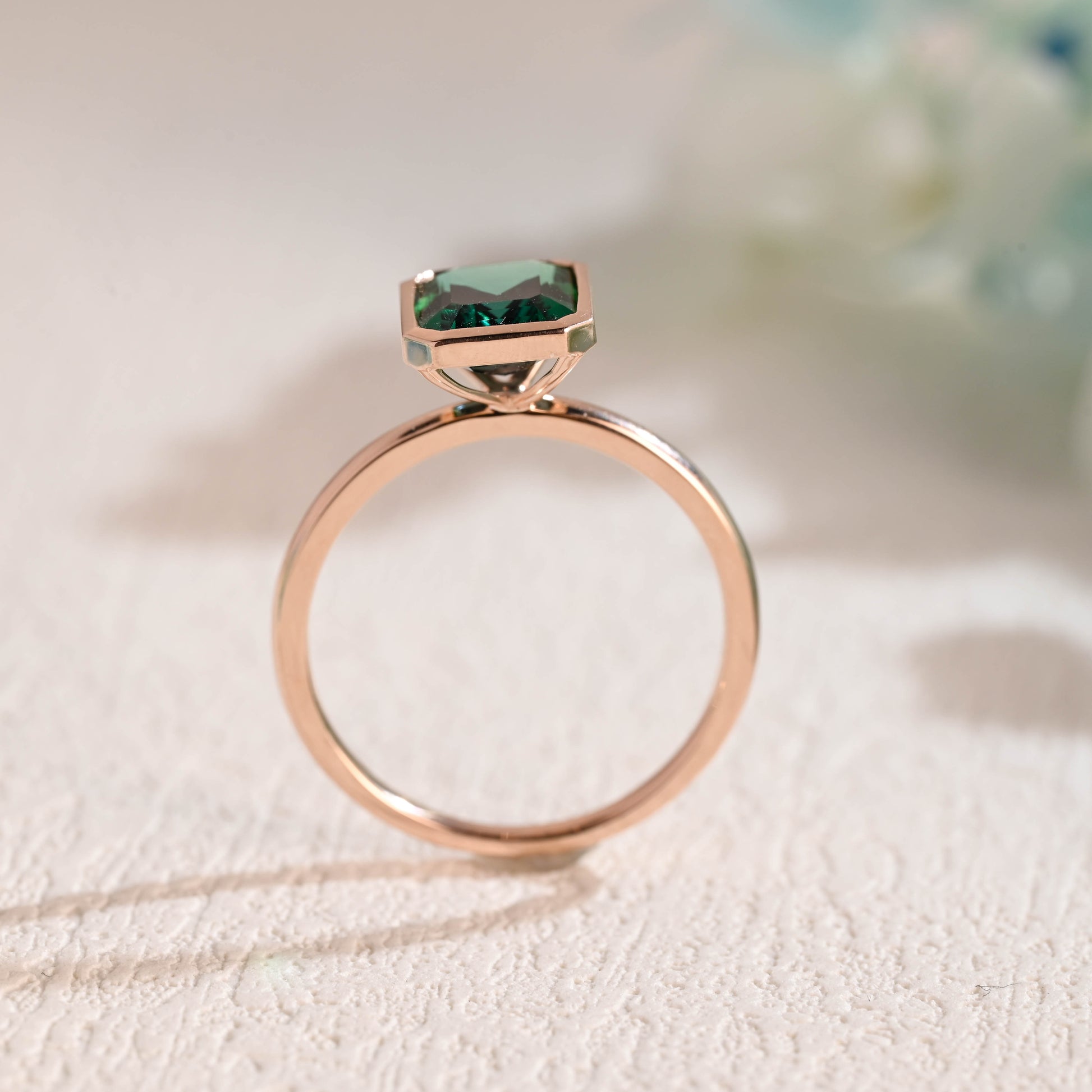 solid-gold-lab-grown-emerald-engagement-ring-promise-ring-bezel-ring