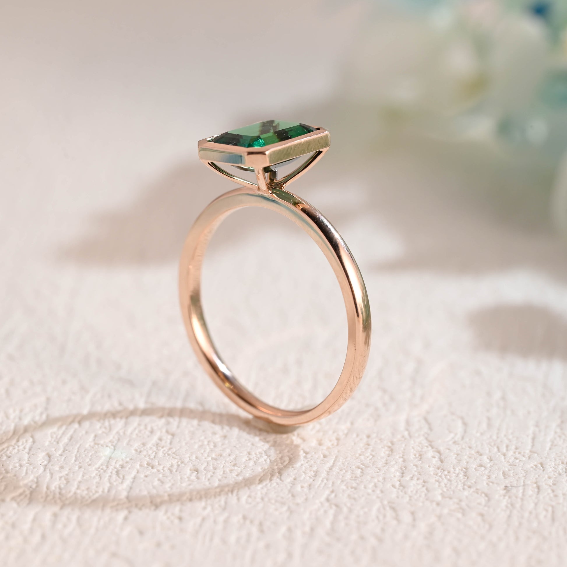 solid-gold-lab-grown-emerald-engagement-ring-promise-ring-bezel-ring