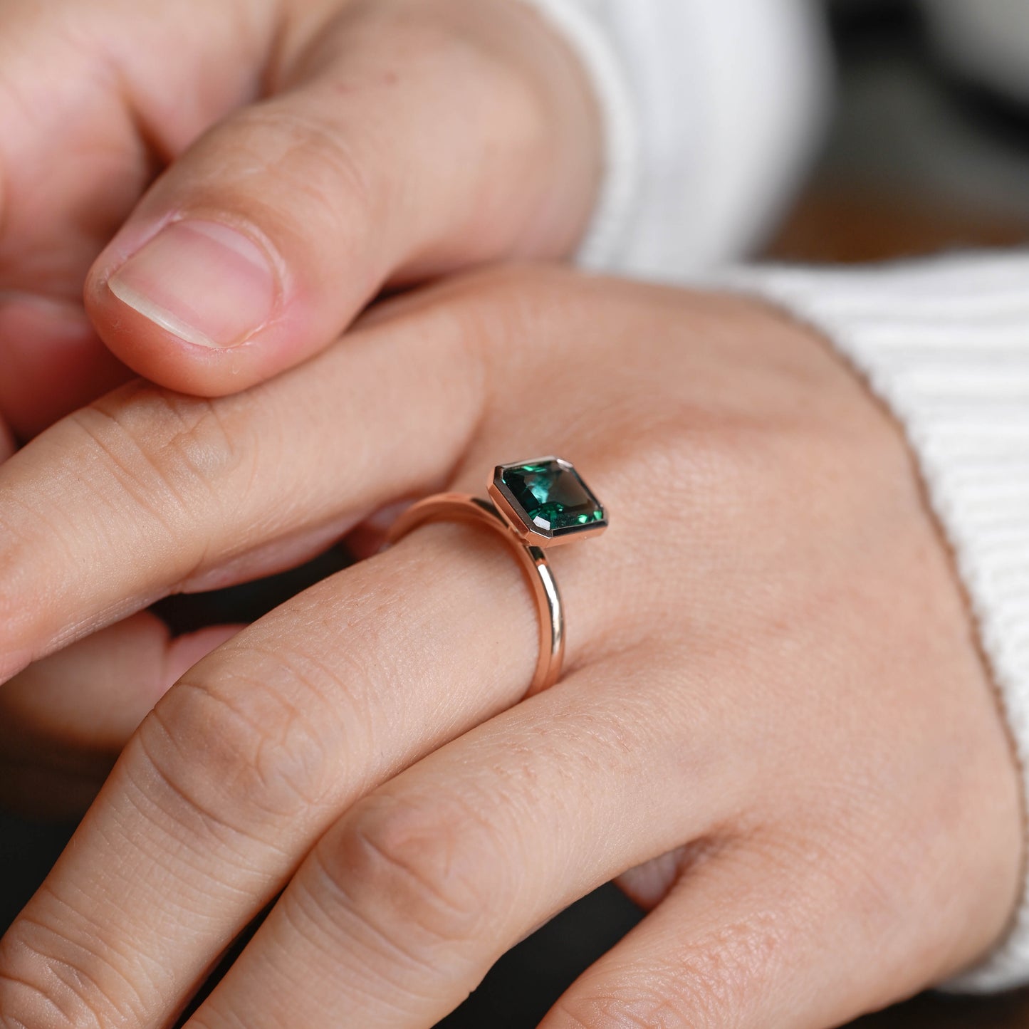 solid-gold-lab-grown-emerald-engagement-ring-promise-ring-bezel-ring