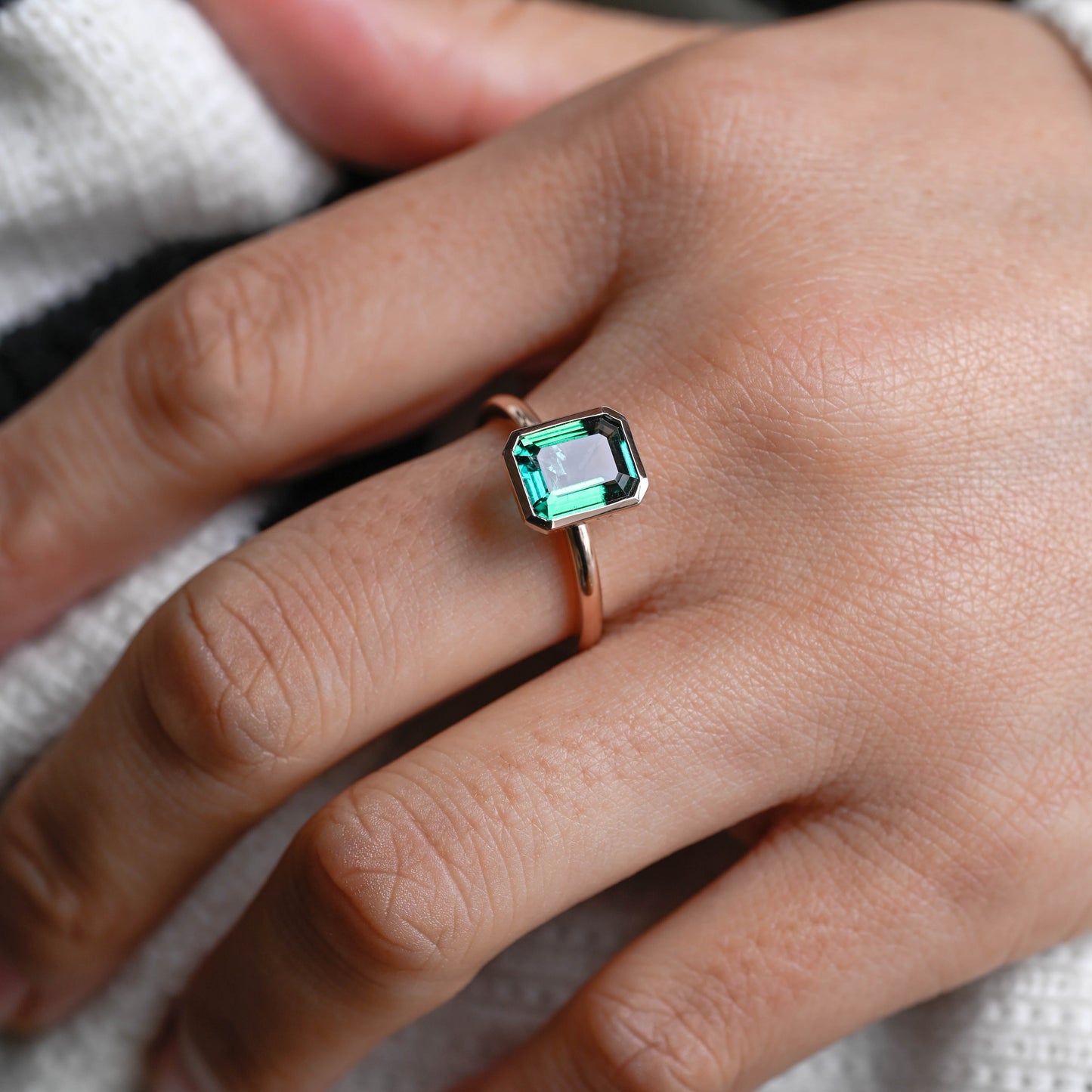 solid-gold-lab-grown-emerald-engagement-ring-promise-ring-bezel-ring