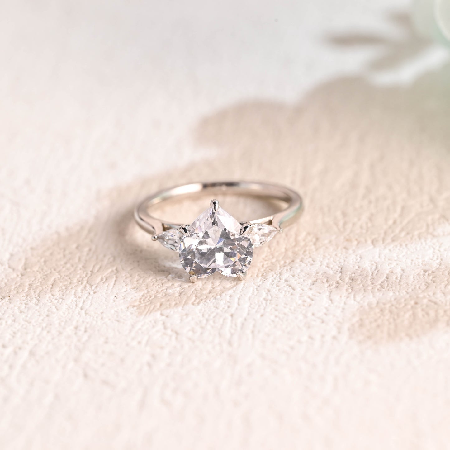 solid-gold-heart-cut-moissanite-engagement-ring-three-stone-ring