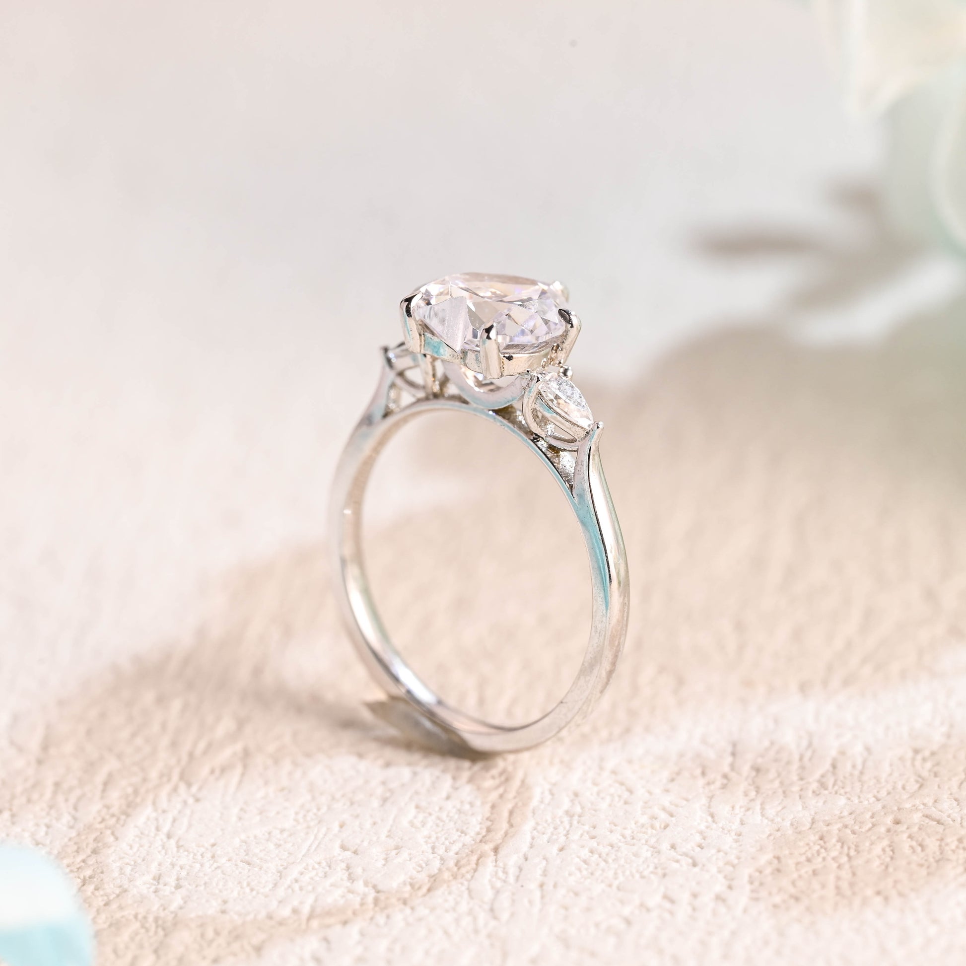 solid-gold-heart-cut-moissanite-engagement-ring-three-stone-ring