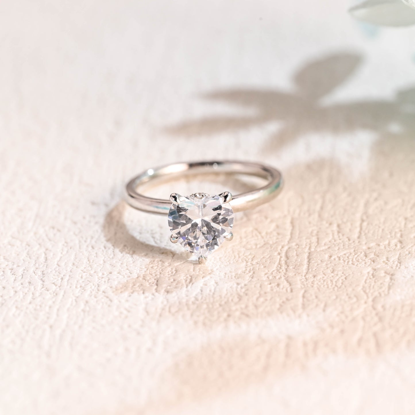 solid-gold-heart-cut-moissanite-engagement-ring-hidden-halo