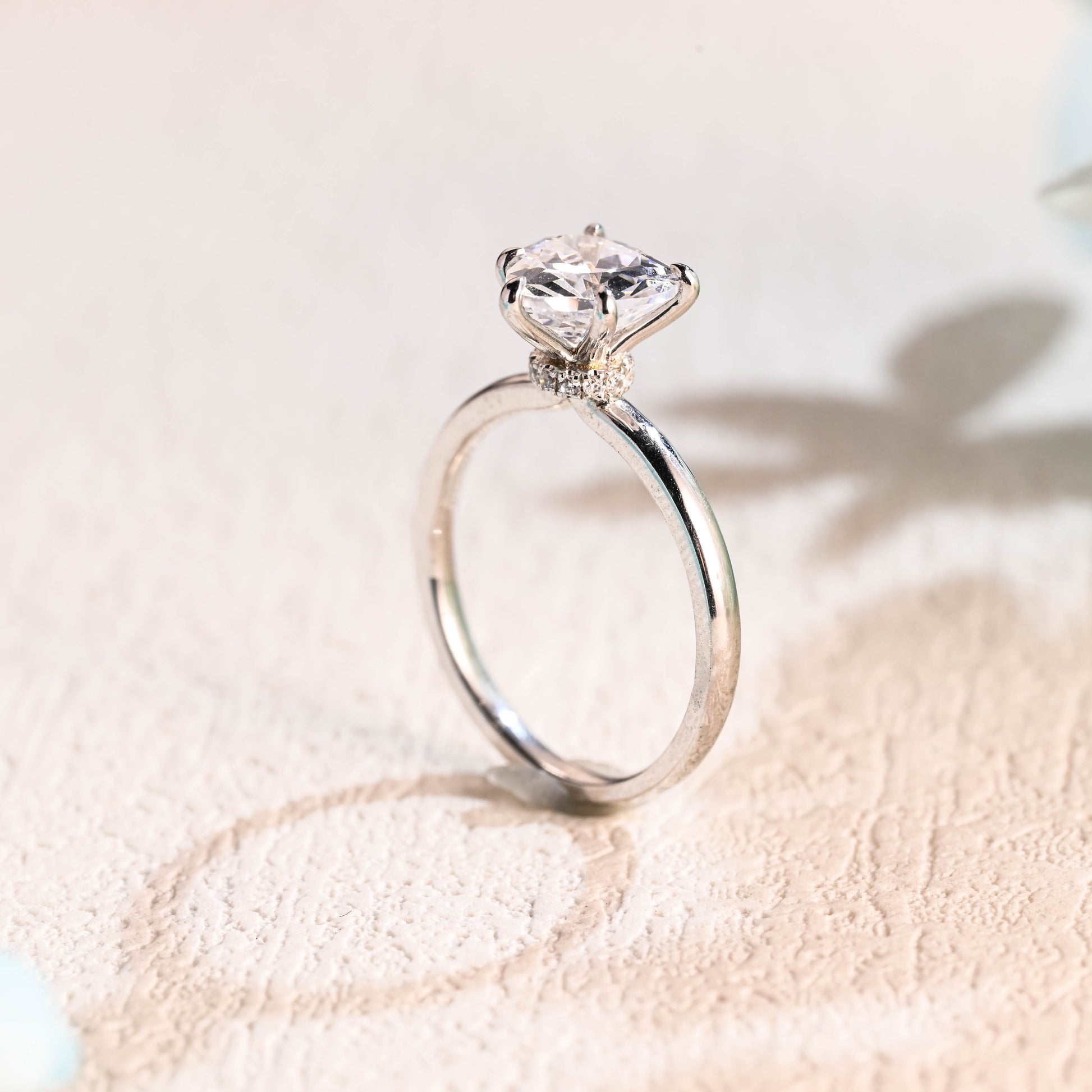 solid-gold-heart-cut-moissanite-engagement-ring-hidden-halo