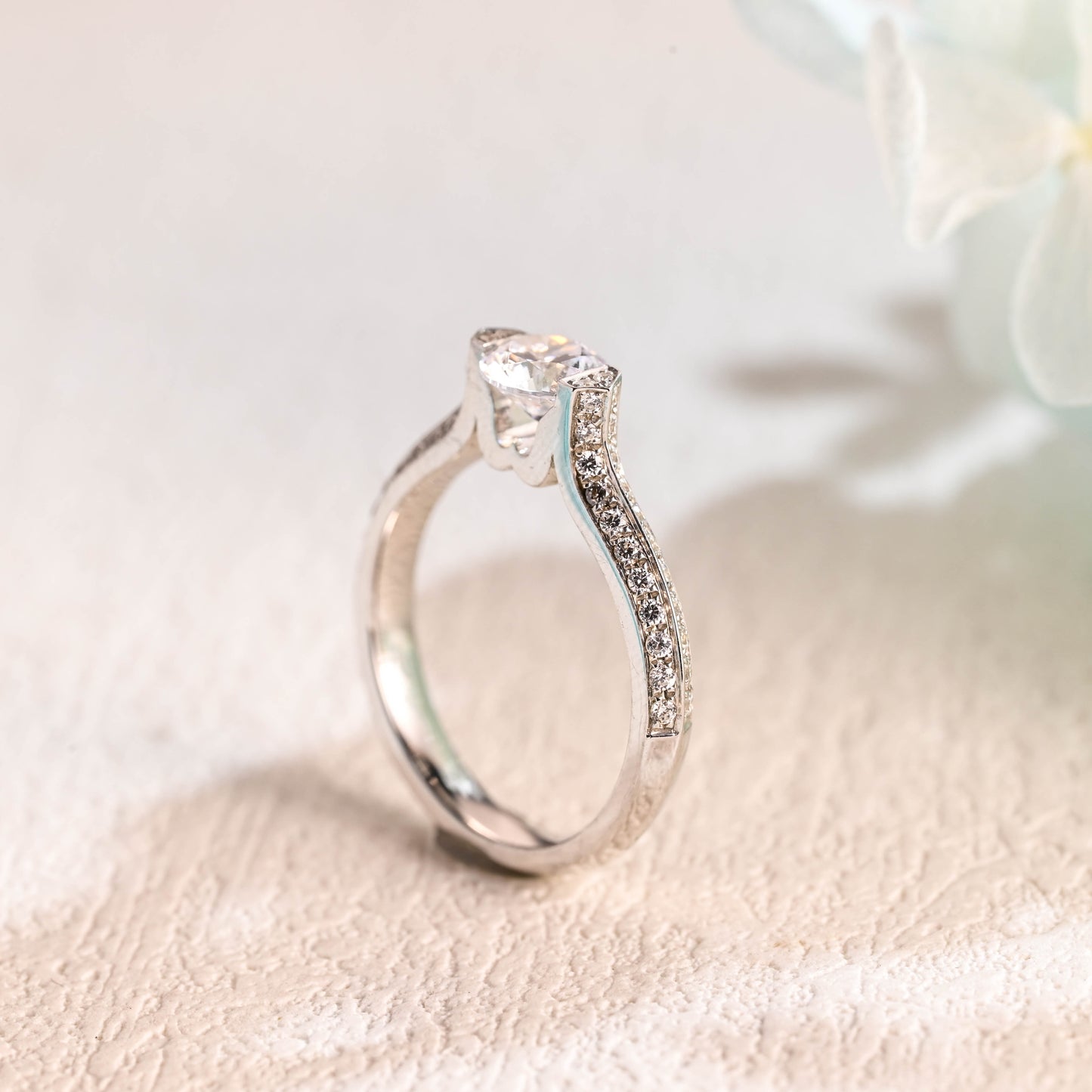 solid-gold-round-cut-moissanite-engagement-ring-double-row-paved-ring