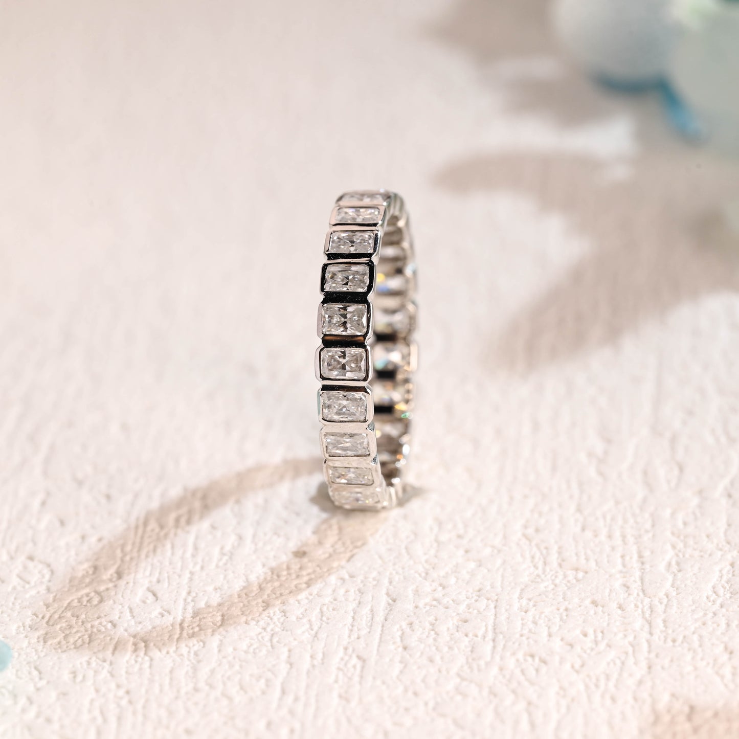 solid-gold-full-eternity-radiant-cut-moissanite-wedding-band-bezel-ring