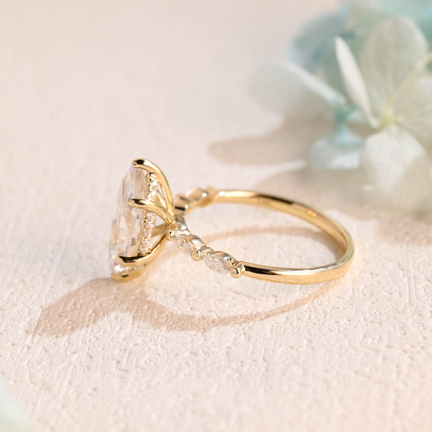 solid-gold-marquise-cut-moissanite-engagement-ring-hidden-halo