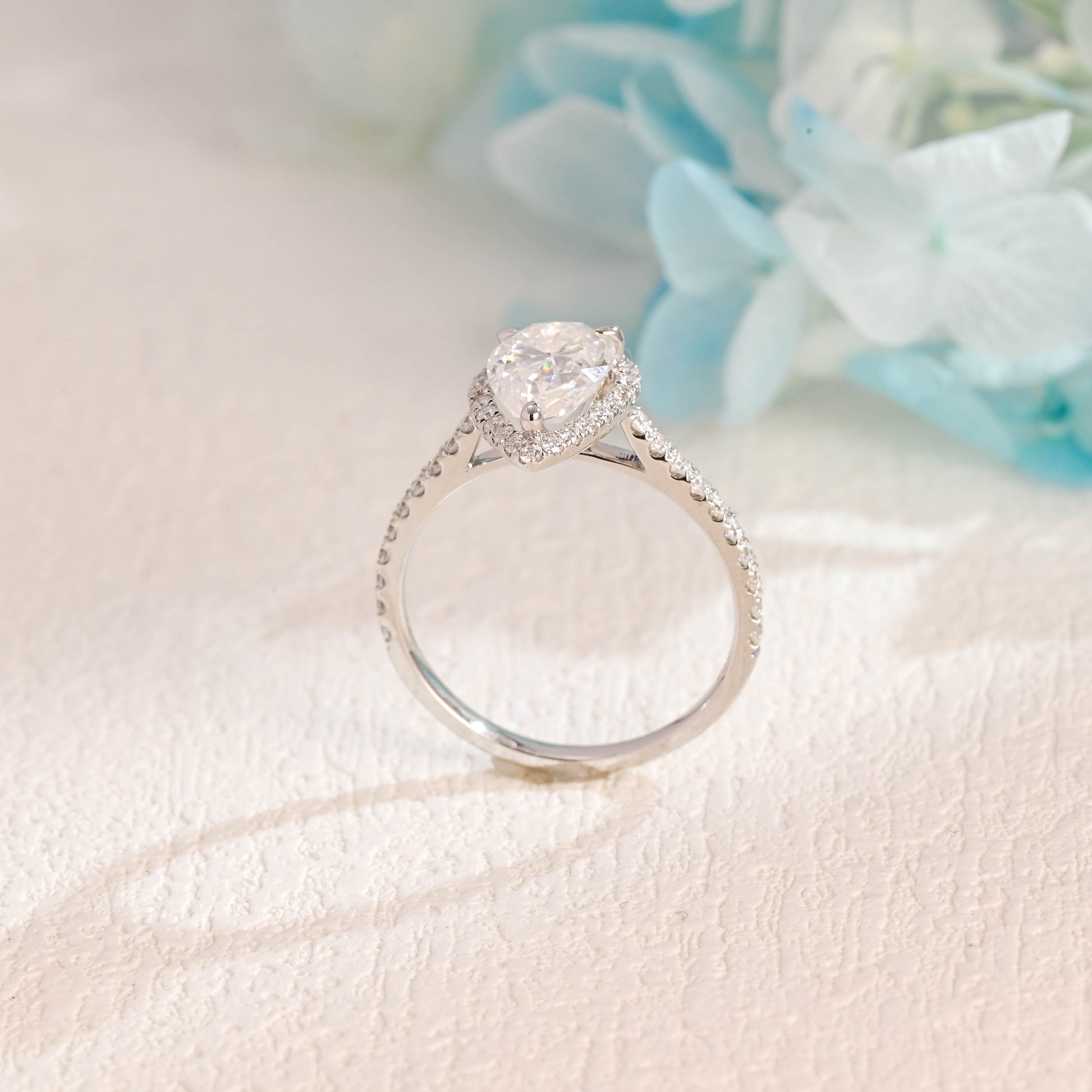 solid-gold-pear-cut-moissanite-engagement-ring