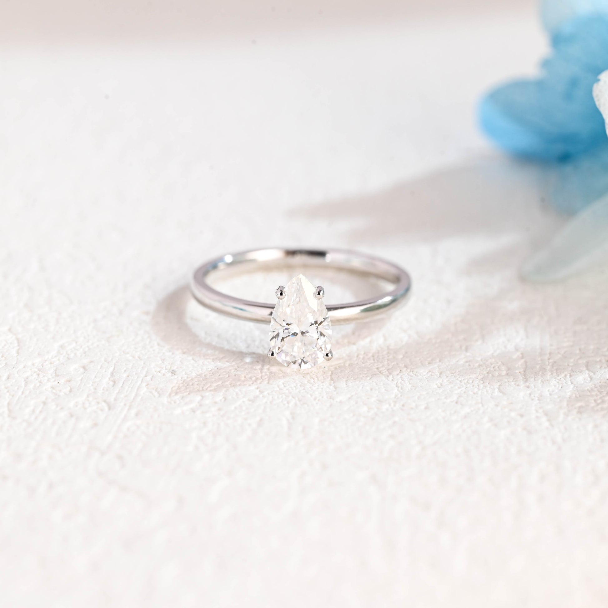 solitaire-pear-moissanite-engagement-ring