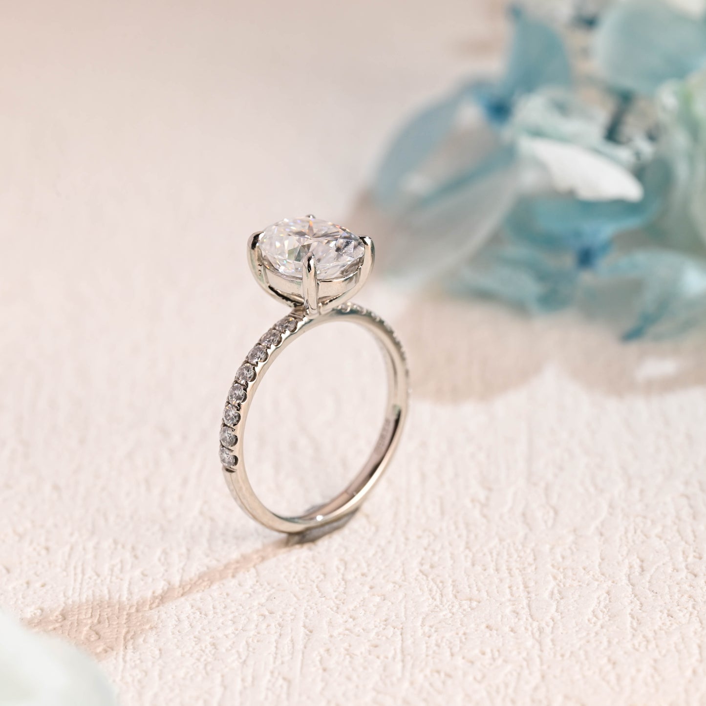 half-pave-oval-moissanite-engagement-ring