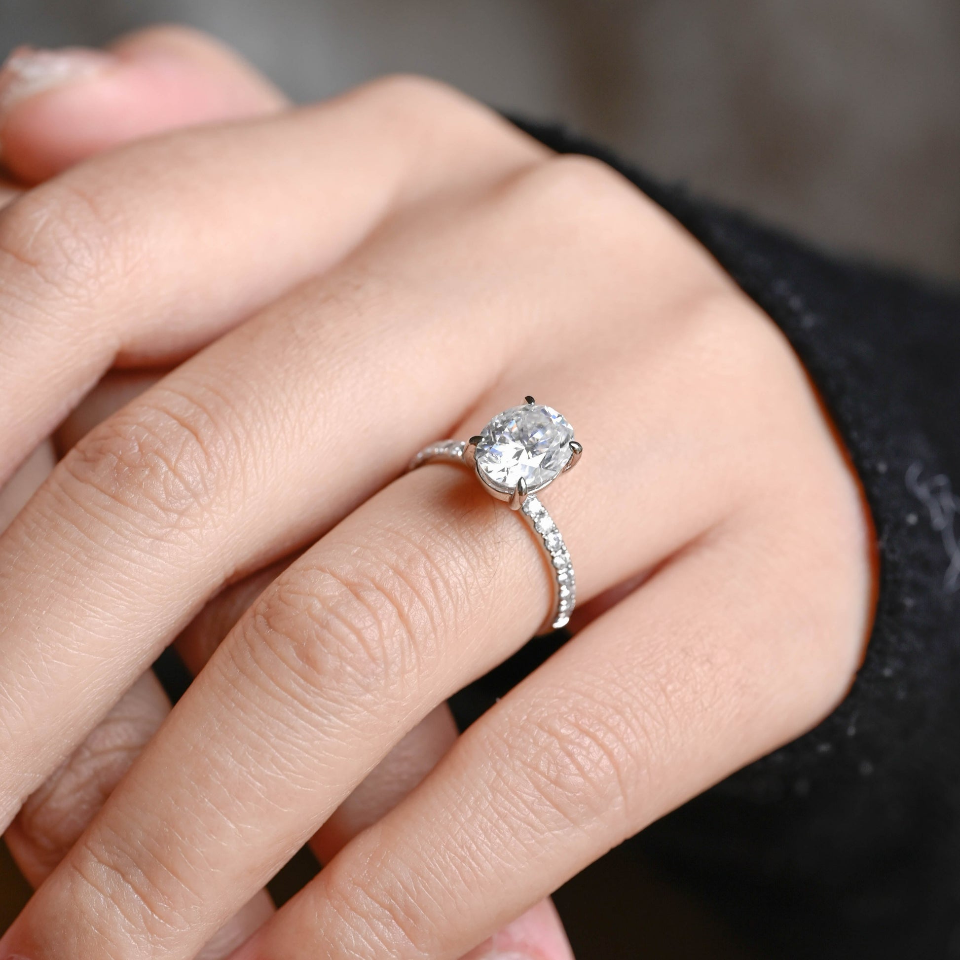 half-pave-oval-moissanite-engagement-ring