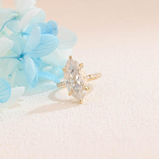 solid-gold-crushed-ice-marquise-cut-moissanite-engagement-ring-paved-ring